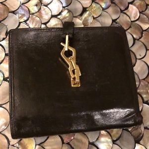 Gucci brown leather wallet with unique gold clasp